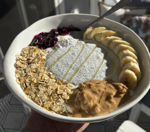 Chia pudding bowl with oats, blueberries, bananas, and peanut butter